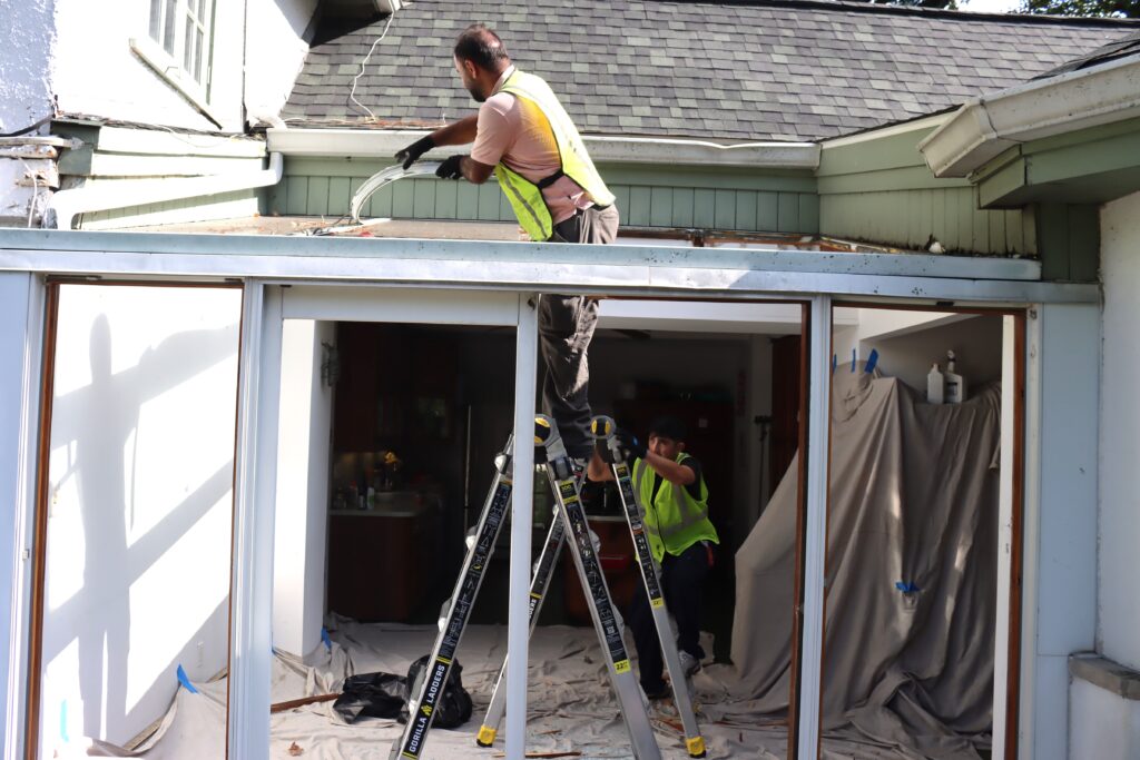 Old leaking wood-framed sunroom before replacement in Verona NJ